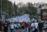Izraelyje į naujausius protestus prieš teismų reformą susirinko dešimtys tūkstančių žmonių. EPA-ELTA nuotr.